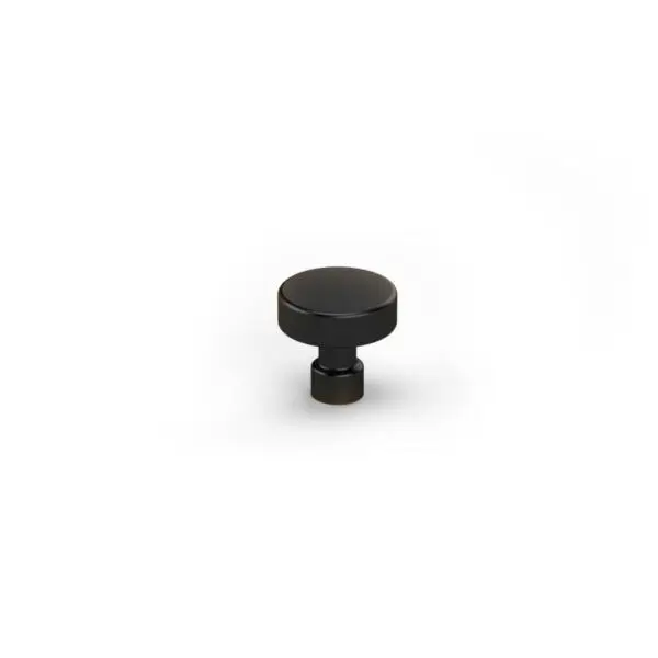 A small black knob on a white background.