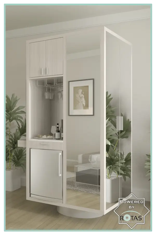 A room with a mirrored wall and a refrigerator