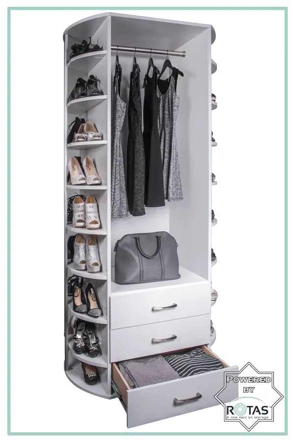 A closet filled with clothes , shoes , a purse and a drawer.
